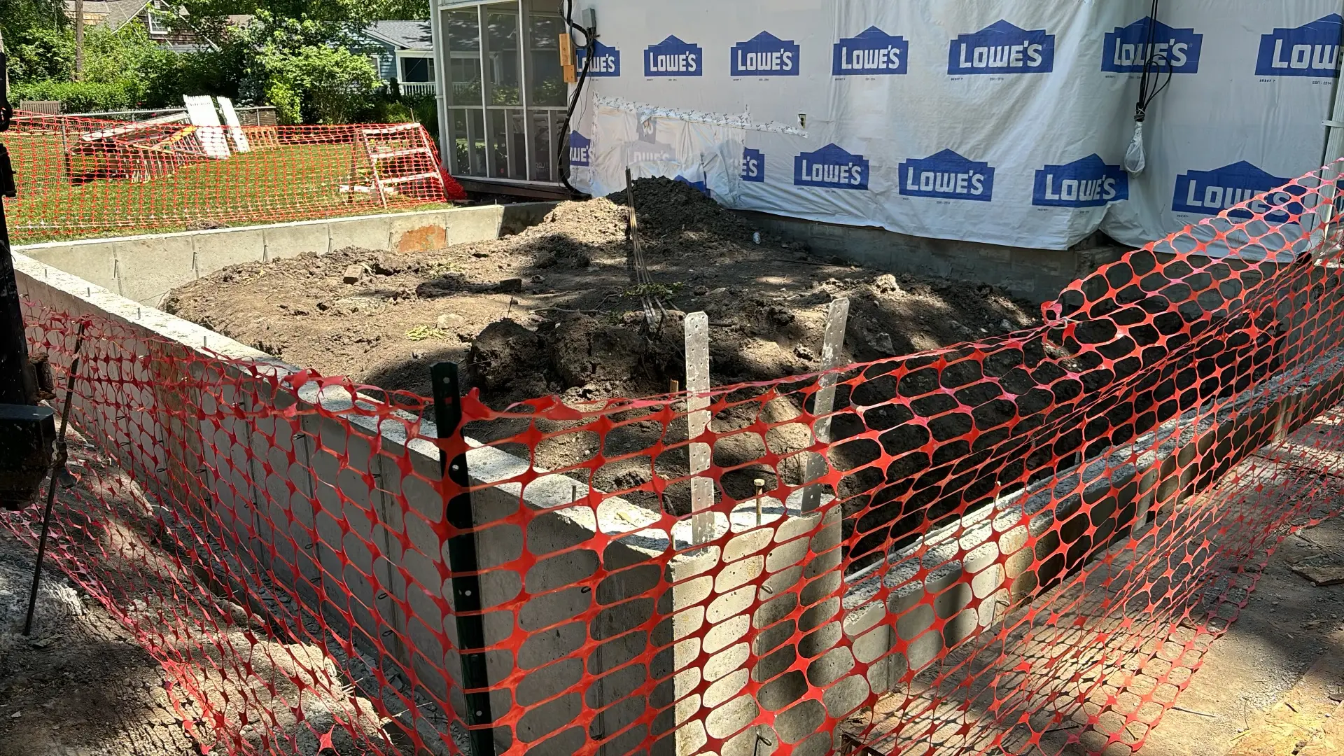 Residential foundation site prepared with reinforcement before concrete placement