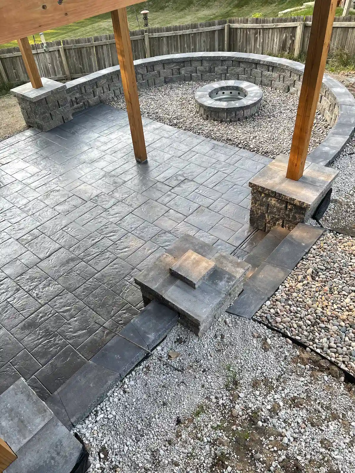 Finished gray stamped concrete patio at a residential home