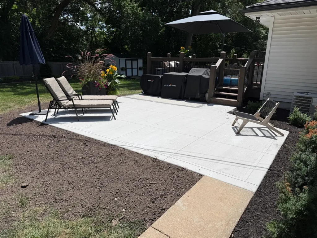 Finished standard concrete patio with outdoor seating installed by B&P Concrete in the Kansas City area